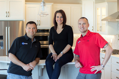 Chris Bachmeier, Samantha Bachmeier, and Brock Butler manage the home building operations for Bachmeier Custom Homes